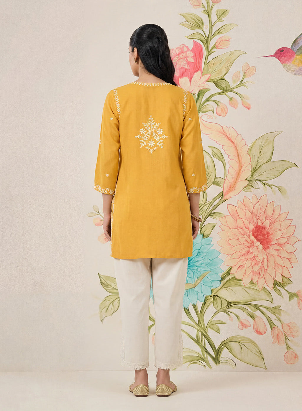 Afiya Yellow Cotton Blend Embroidered Kurti