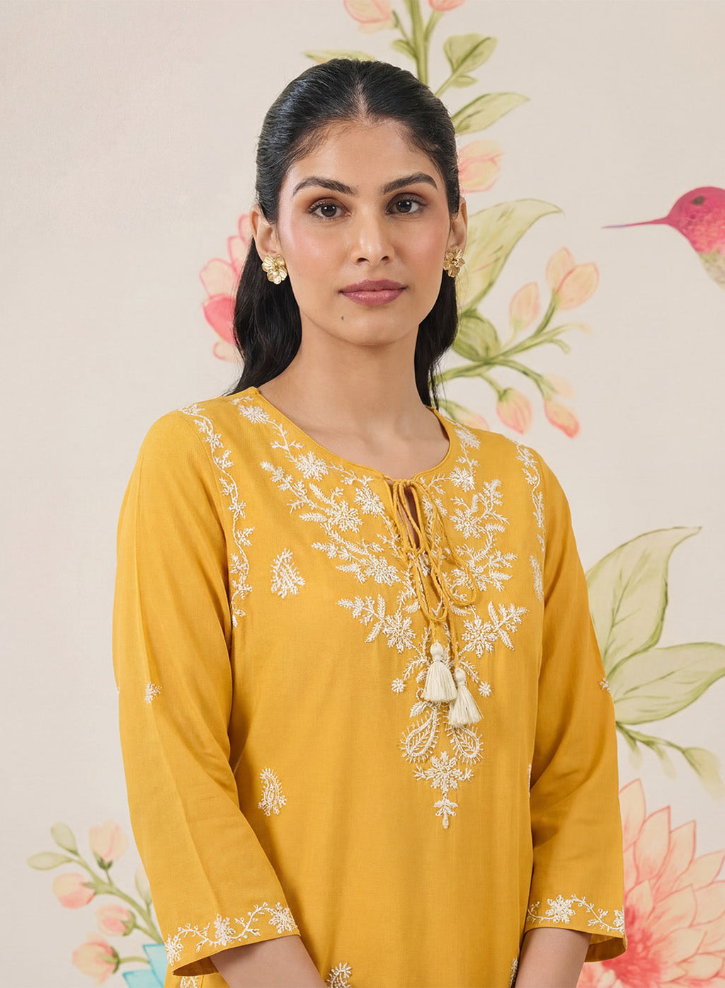 Afiya Yellow Cotton Blend Embroidered Kurti