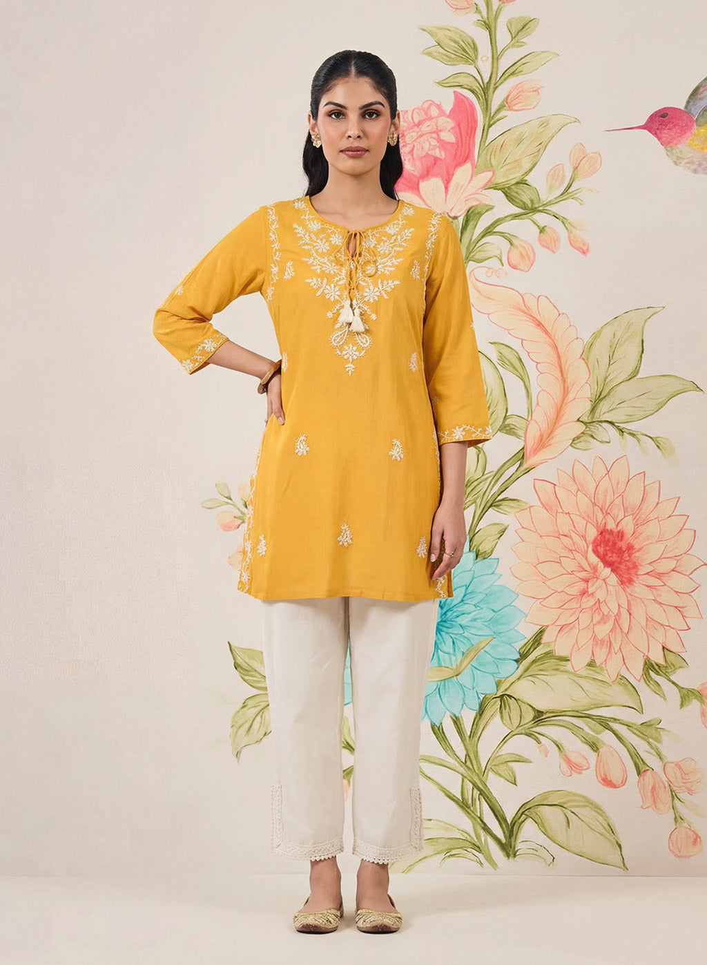 Afiya Yellow Cotton Blend Embroidered Kurti