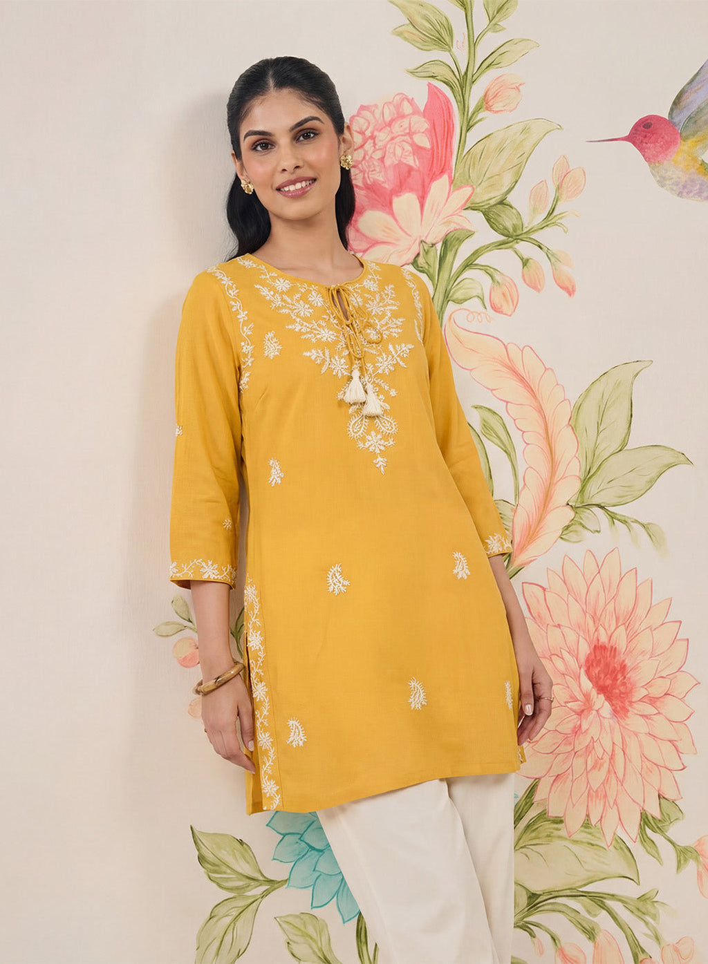 Afiya Yellow Cotton Blend Embroidered Kurti