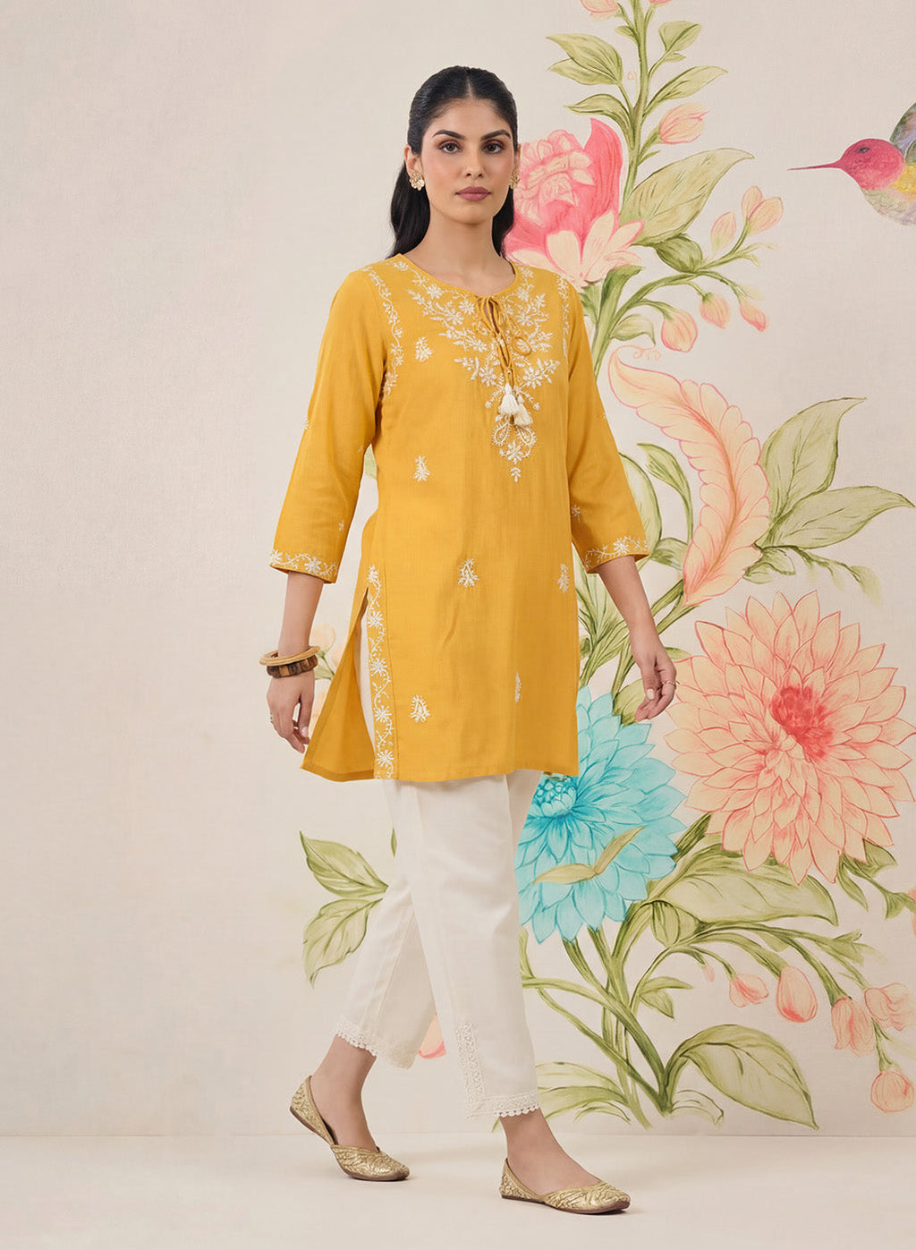 Afiya Yellow Cotton Blend Embroidered Kurti